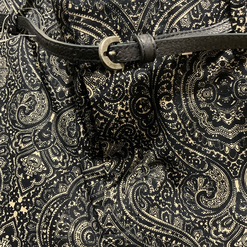 Women’s parsley capri pants, festive paisley design. Professional casual.